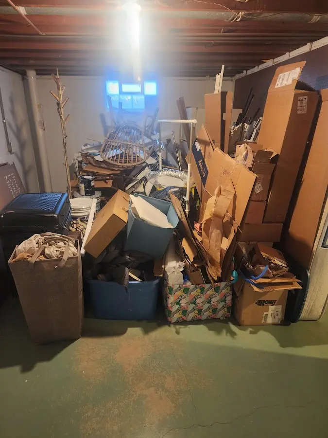 Roll-off dumpster container at job site for 2 Yard Dumpster Rental in North Hills